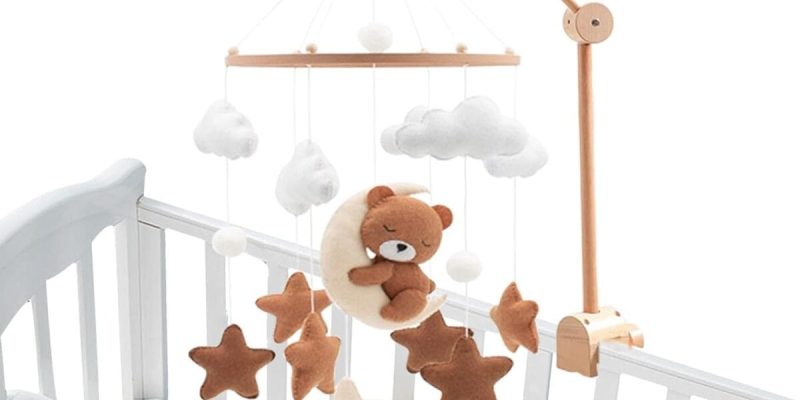Test mobile bébé bois : élégance et douceur au berceau